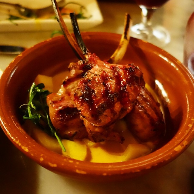 Buceo 95 - Upper West Side - NYC – Costillas de Cordero – Baby lamb chops, vanilla poached mango, marcona almonds, harissa cream and watercress.