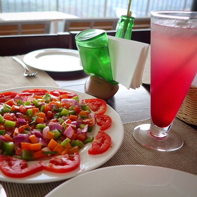 otherwise you will waste your time there being stuck in the bathroom sick.  By this time, about our 11th or 12th day in India, I hadn’t had a single raw vegetable or cube of ice, haha.  ALL I wanted was raw veggies. I didn’t want to see another soft cooked vegetable! I crossed my fingers, since I knew the Ragamaya Resort had their own filtration system for the whole place, and ate this salad. Thankfully I did NOT get sick and this was very very very delicious. It was topped with fresh black pepper and mint grown right in the region.  The Pink Cooler was lemon juice, also grown around the corner, litchi juice and grenadine. So refreshing. This was our last day before our 26 hour commute home.  I was very lucky that I was able to purchase the bent glass napkin holder pictured in the background, since it was one of the last ones they had available. I now use it as a vase on my desk at work :)