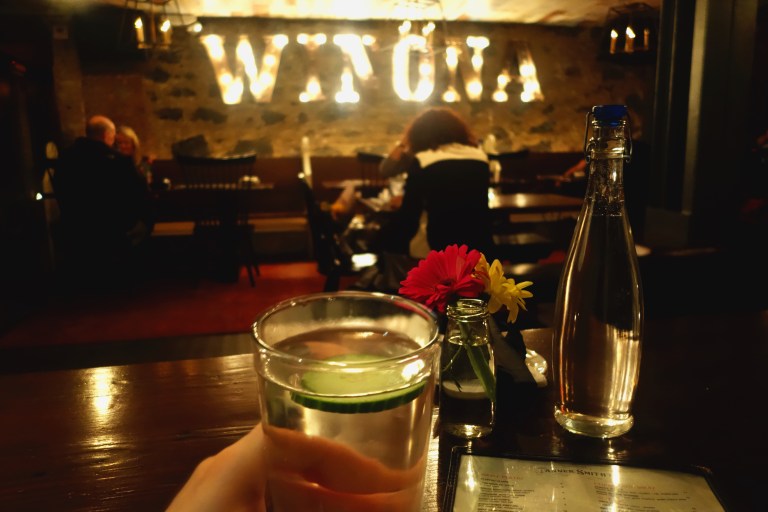 Tanner Smiths – Midtown NYC - view of the downstairs seating area and my cucumber water