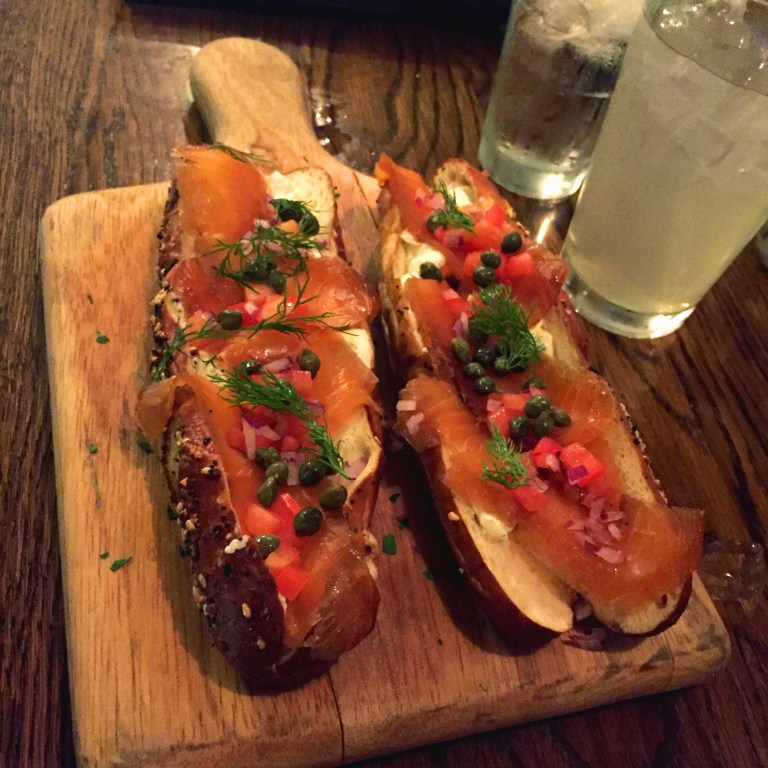 Tanner Smiths – Midtown NYC – Smoked Salmon Sammy – House smoked Atlantic salmon, dill cream cheese, on a warm everything pretzel with capers tomato and red onion FTW