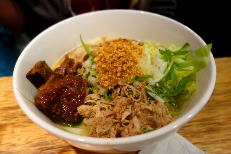 Totto Ramen - Midtown 52nd Street NYC - Alycia's Mega Paitan. $16 worth of some pretty amazing deliciousness. The pork belly chunks on the left are TO DIE FOR. YUM. You can't see in this pic, but in the back is also the pork char siu.