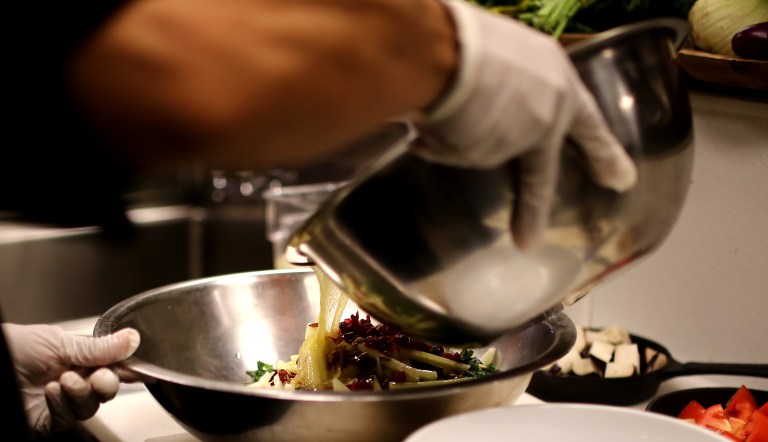 Dressing the salad - 1 tablespoon garlic, one tablespoon fresh ginger, 1 cup lime juice, 1 and a half cup olive oil and kosher salt.