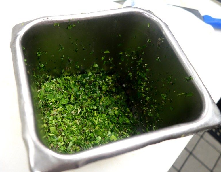 The fresh herbs used for garnish are also the same mixture that is used in their herbed salmon. That version is marinated overnight in house made garlic oil, which is chopped garlic soaked in olive oil, along with rosemary, oregano, thyme, parsley and salt. Yum.