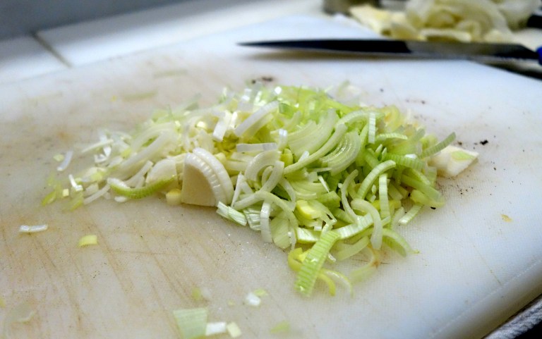 The leeks are given a quick bath to make sure that all the grit is removed.