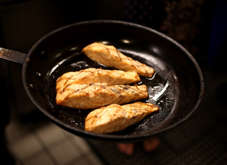 The salmon is finished baking and looks amazing. You can see the delicious, natural oils from the salmon in the pan.