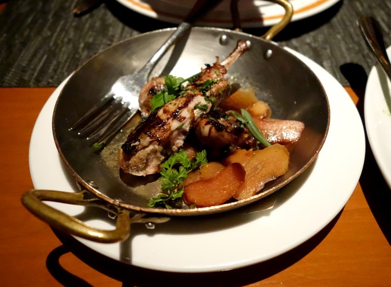 Quail on top of a cranberry, ginger relish.