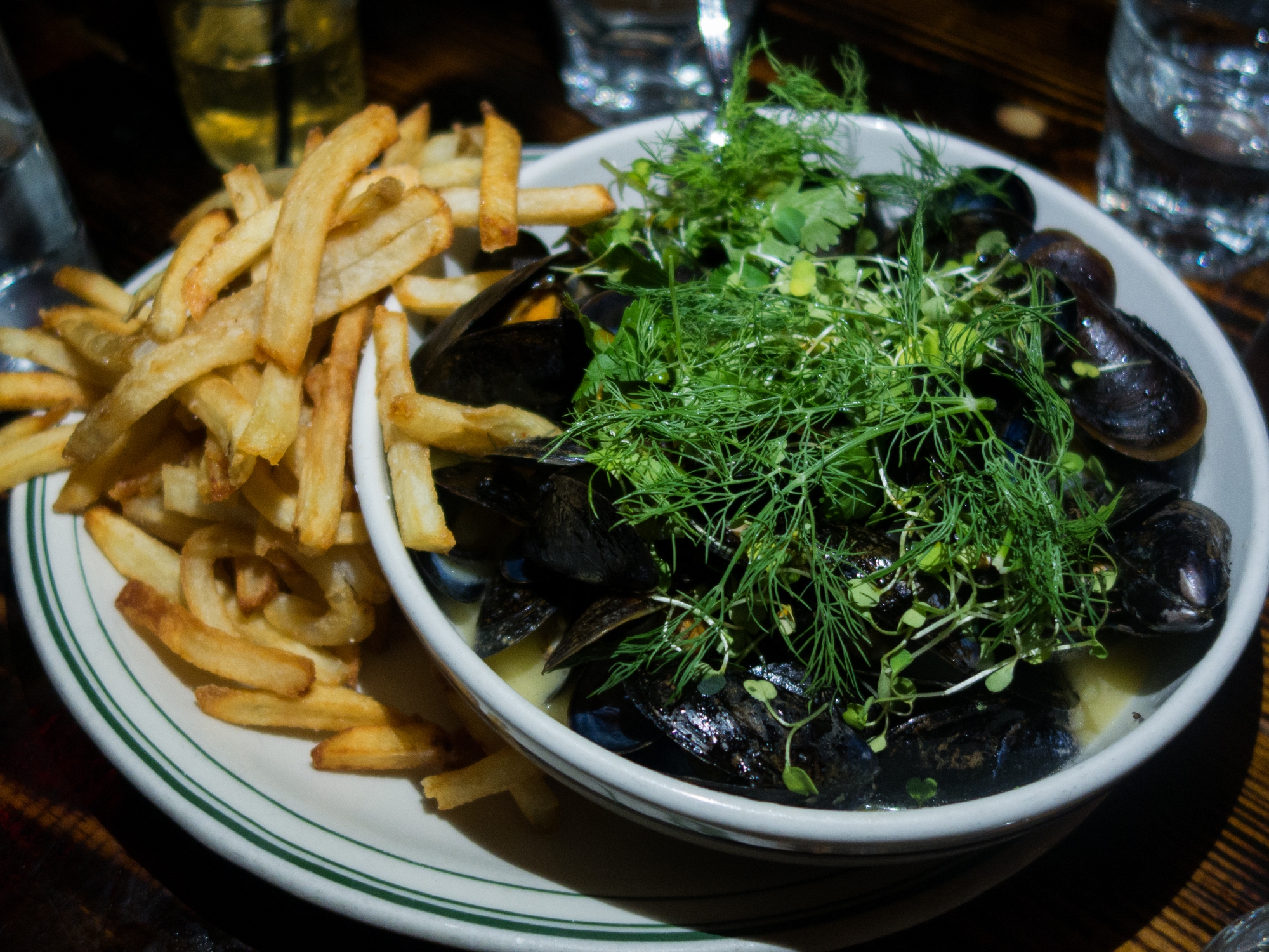 Jacob’s Pickles – White Wine Mussels – PEI Mussels in a white wine and butter broth with garlic and onions. Served with fresh cut fries